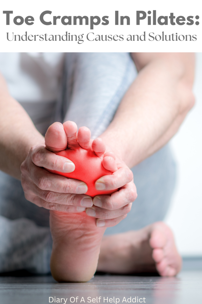 woman grasping her left foot with her hands and redness to the ball of foot as if it's in pain