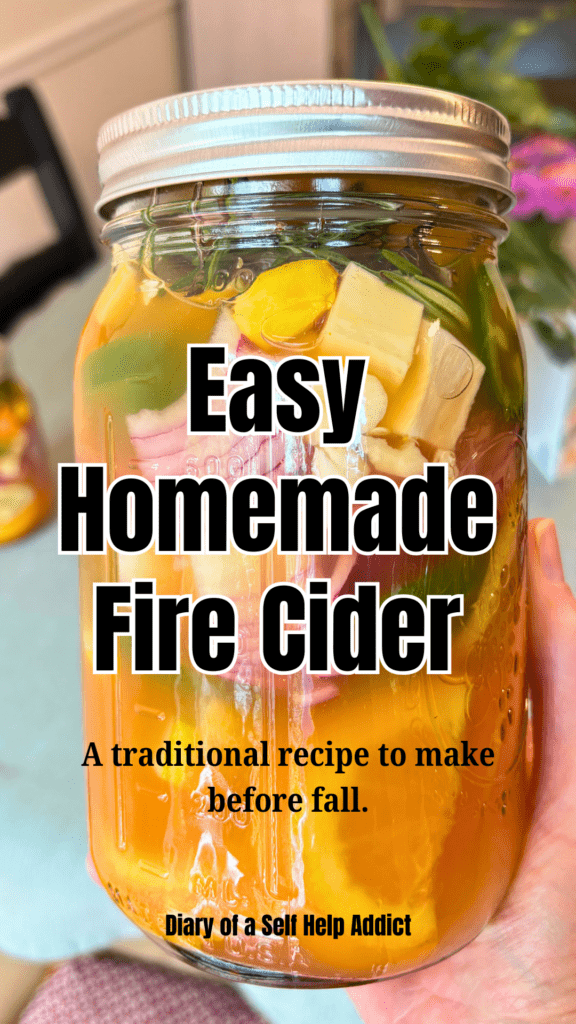 a mason jar full of fire cider ingredients.