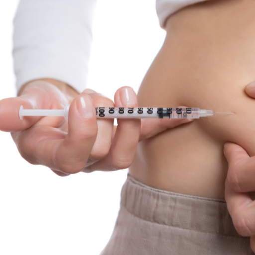 a woman administering a peptide via subcutaneous injection into her abdomen