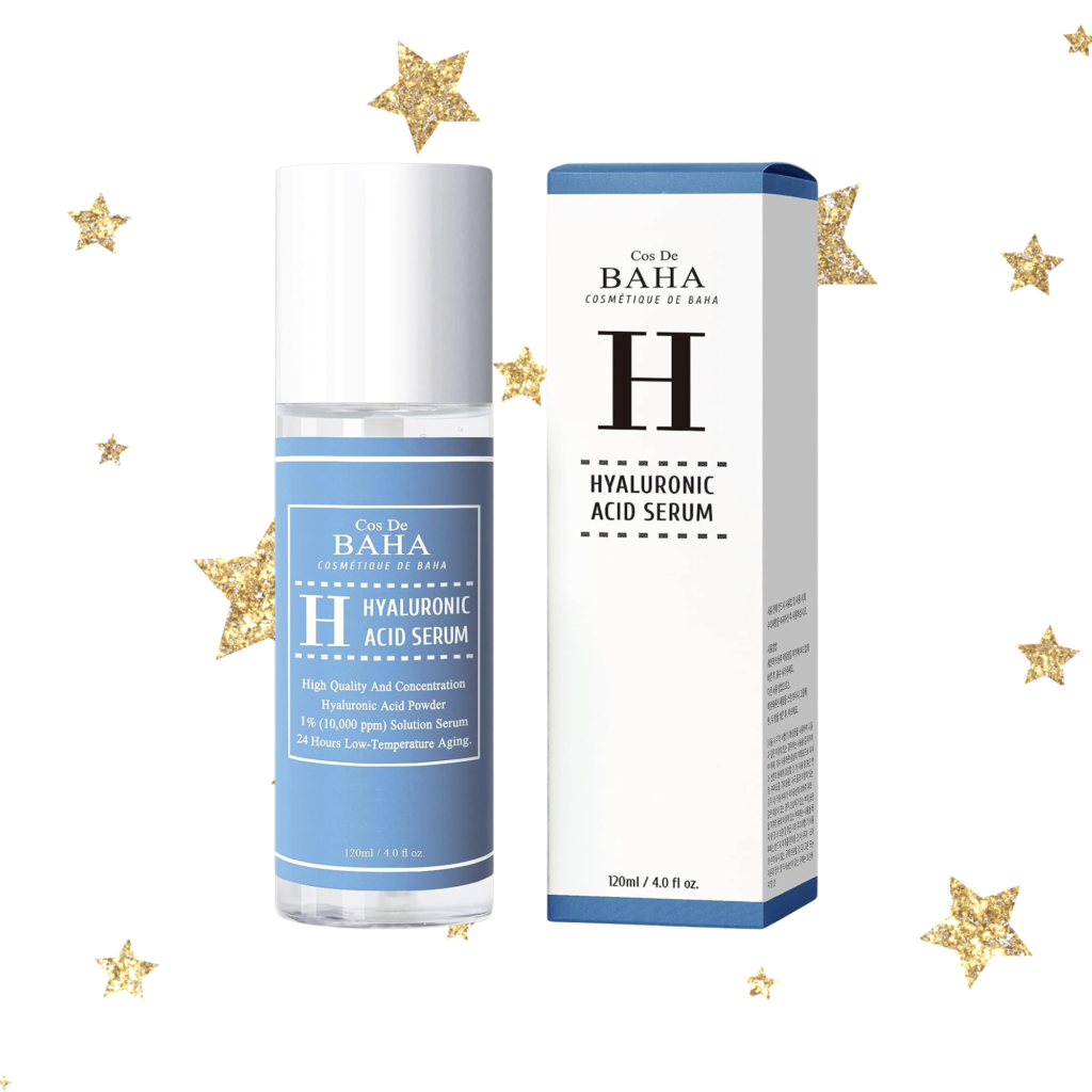 a bottle of cos de Baha's hyaluronic acid and the box it comes in next to it with gold stars in the background