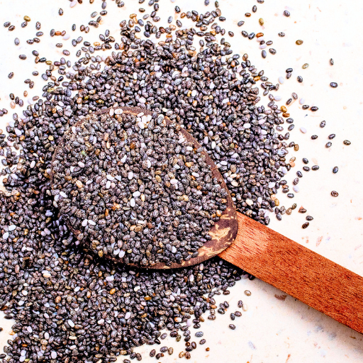 chia seeds spilling out of a tablespoon