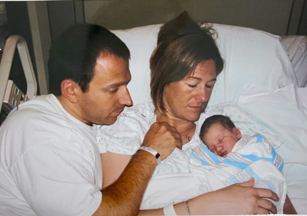 mark and kelly holding natalie shortly after her birth