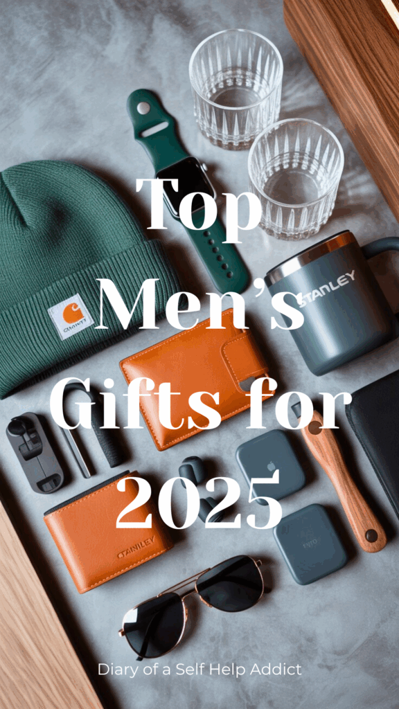A clean, modern flat-lay collage of men’s gifts on a wood or concrete background. Includes items like an Apple Watch, Carhartt beanie, whiskey glasses, AirTag wallet, Stanley mug, grooming kit, sunglasses, and tech gadgets. Color palette: charcoal, forest green, tan, and black for a masculine holiday feel.