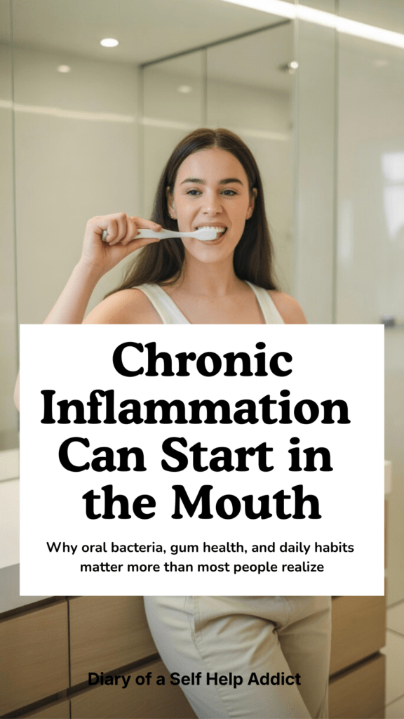 a woman brushing her teeth in a neutral colored bathroom