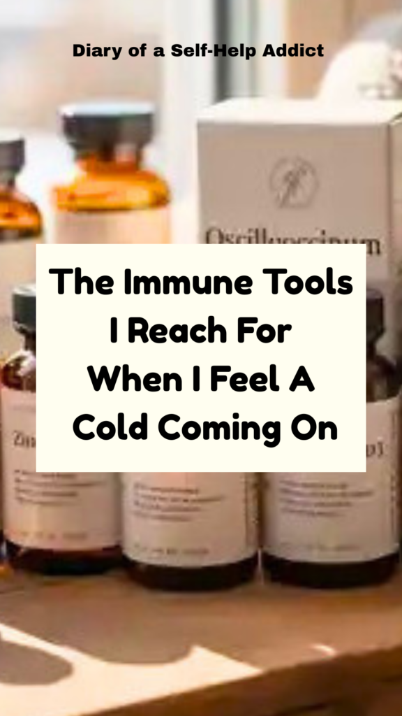 Wooden shelf with neatly arranged bottles: quercetin, zinc, colostrum, oil of oregano, grapefruit seed extract, vitamin D3, and magnesium. Include a small homeopathic Oscillococcinum box. Soft natural light, cozy winter vibe.