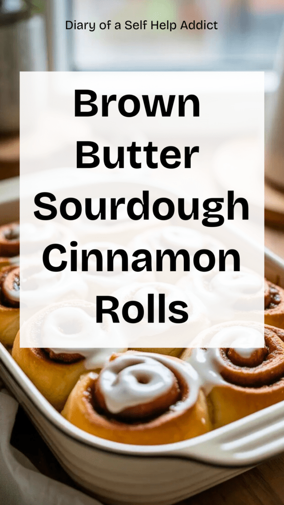 Brown butter cinnamon sugar filling being spread over rolled sourdough dough, offset spatula in motion, rich caramel color, textured wood countertop, baking process shot, warm moody lighting