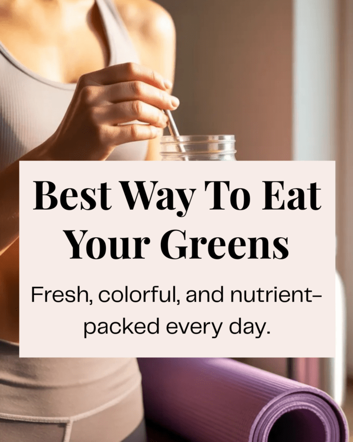 Person holding a green smoothie in a mason jar while in workout clothes, with a yoga mat and water bottle nearby, morning light.