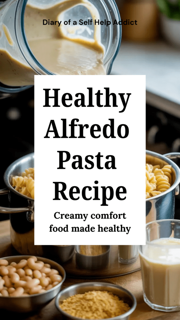 Blender pouring creamy white bean Alfredo sauce over chickpea pasta in a pot. Ingredients (beans, soy milk, nutritional yeast) sitting beside the blender.