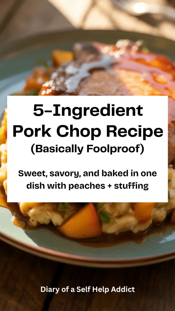 Golden-brown pork chops glazed with a glossy peach sauce, resting on a bed of fluffy stuffing studded with soft peach slices. The glaze is slightly caramelized, and the dish is served warm in a white baking dish with a rustic wooden table background.