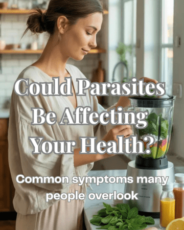 A woman in comfy neutral loungewear standing in a bright kitchen preparing a wellness drink with fresh herbs and supplements, giving healthy lifestyle and detox reset vibes.