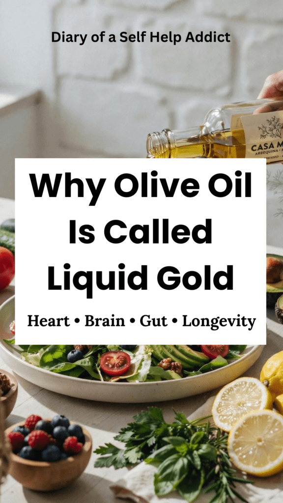 A Mediterranean-inspired table filled with colorful vegetables, tomatoes, cucumbers, avocados, leafy greens, berries, walnuts, fresh herbs, lemons, and a bottle of extra virgin olive oil being drizzled over a vibrant salad in bright natural light.