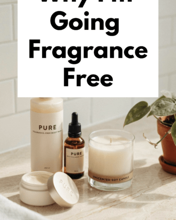 A bright, clean bathroom or vanity scene featuring simple fragrance-free personal-care products, an unscented candle, folded white towels and minimal decor. Natural light, warm and realistic rather than overly clinical.