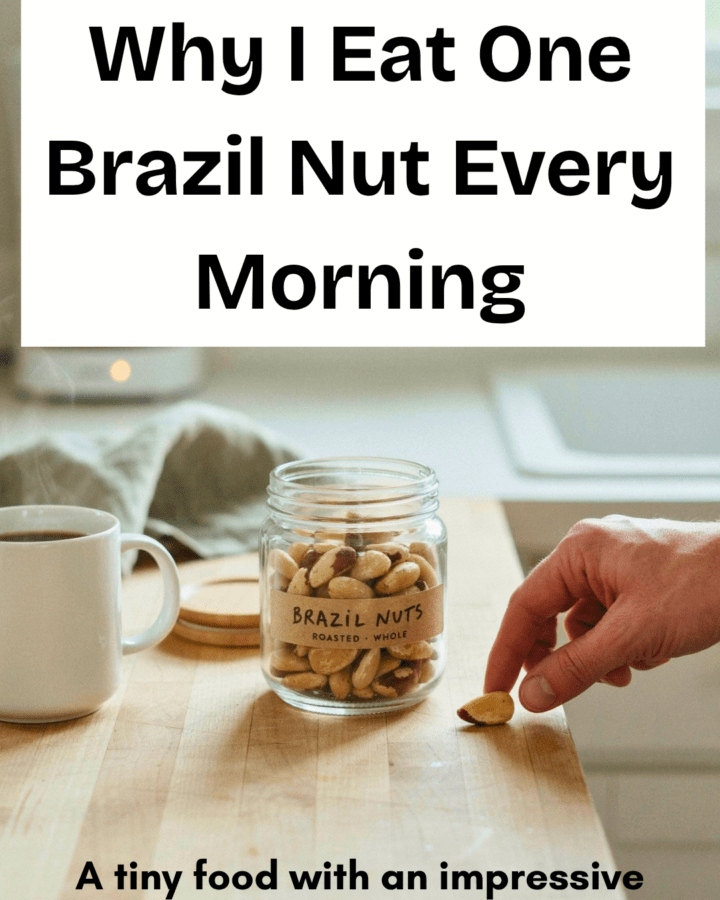 A hand reaching for one Brazil nut from a glass jar beside a coffee maker or coffee mug in a sunlit kitchen. The image should feel realistic and attainable—not overly styled—and communicate an easy habit connected to an established morning routine.