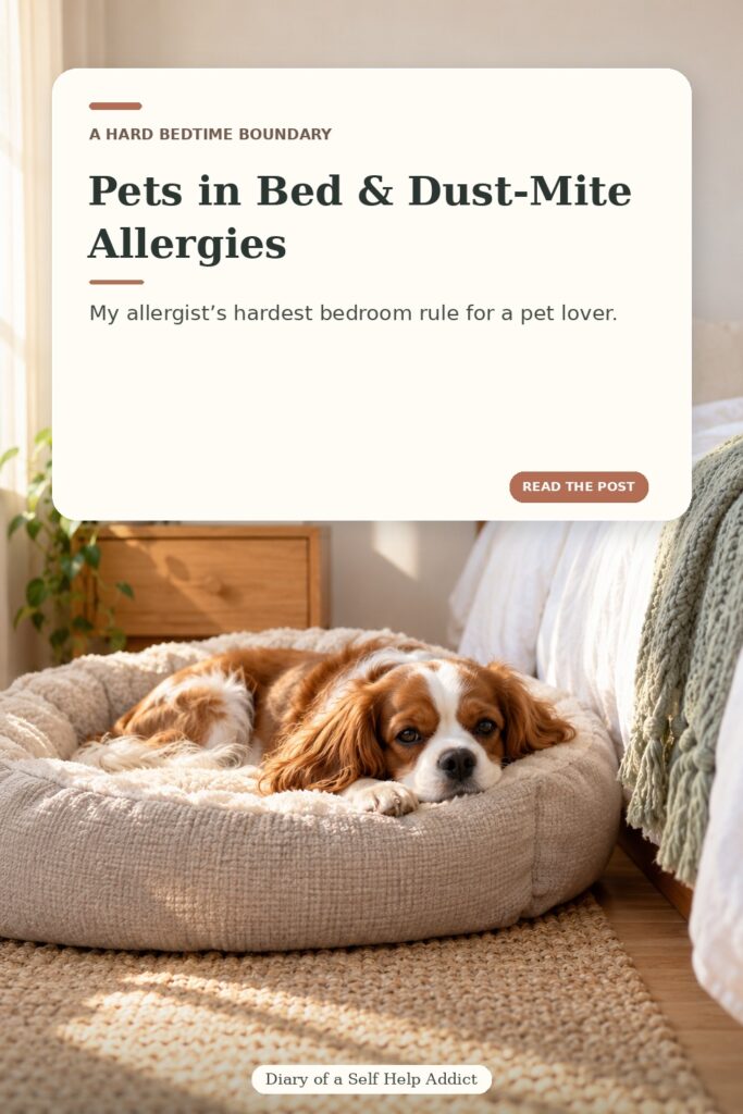 Vertical warm bedroom photo of a small dog relaxing on its own cushioned dog bed beside a human bed. The overlay reads “Pets in Bed & Dust-Mite Allergies” and “My allergist’s hardest bedroom rule for a pet lover.” Diary of a Self Help Addict appears discreetly at the bottom.